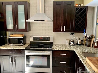 GRANITE COUNTER AND STAINLESS STEEL APPLIANCES
