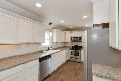 On trend cabinets and recessed lighting.