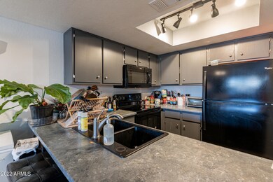 Kitchen w/ Gray Cabinets
