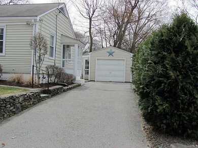 Exterior Front. DRIVEWAY