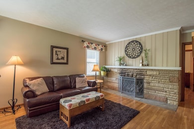 Living Room with Stone Fireplace