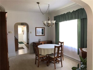 Dining room with another large window allowing for