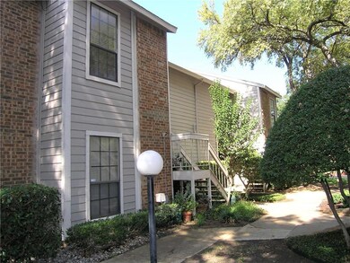 VIEW FROM OTHER SIDE OF ENTRY STEPS AND SIDEWALKS 