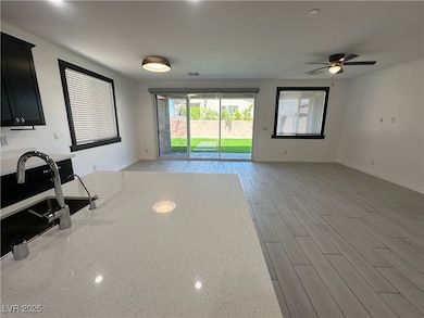 Unfurnished living room featuring healthy amount o