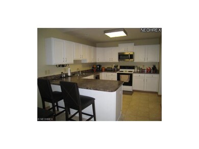 Spacious kitchen with dishwasher, oven, range and 