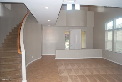 Vaulted ceilings & curved stairway