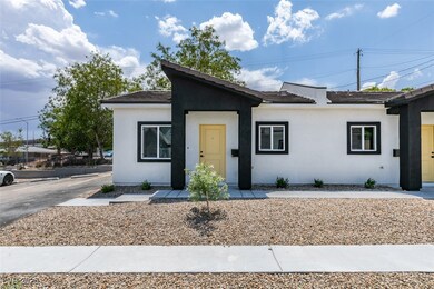 View of front of house featuring stucco siding