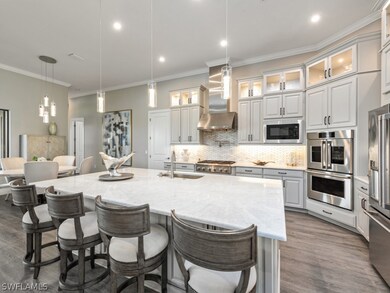 Kitchen with appliances with stainless steel finis