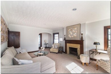 Bright living room with tile fireplace, brand new 