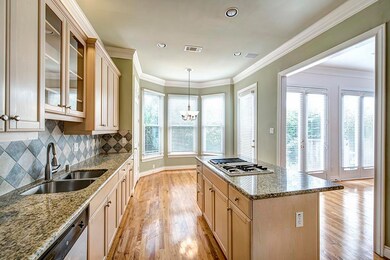 Huge light and bright gourmet kitchen with granite
