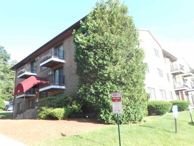 Another view of Building 128 shows landscaping & a