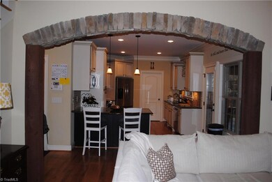 Stone and Timber entry to Kitchen from Great Room
