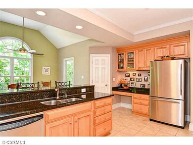 Kitchen - GE Profile refrigerator conveys, convenient desk, pantry