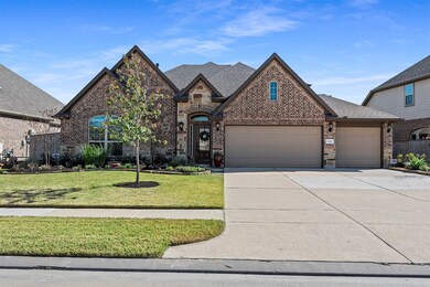 This stunning home boasts and upgraded professional landscape package and a three car side by side garage.