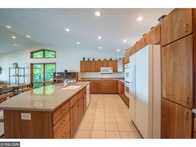 Custom cabinetry throughout the home is natural ch