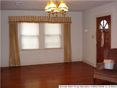 Living room, hardwood floors throughout most of ho