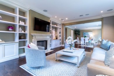 Oversized Living has Fireplace & built-ins.