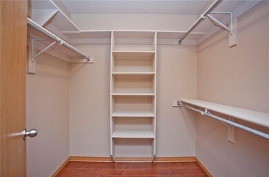 Closet with built-in shelving.