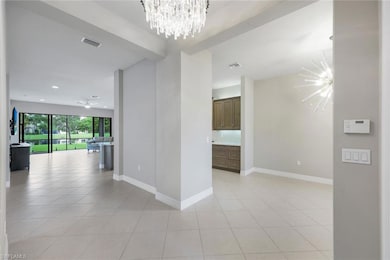 Bright foyer with chandelier