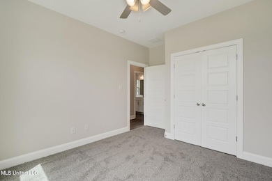 Photo is of a similar home,