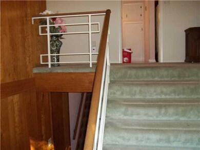 Foyer. Looking from front door up the stairs.
