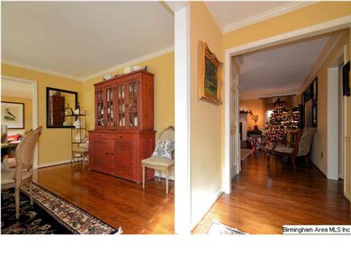 Entry to updated home has direct view of greatroom