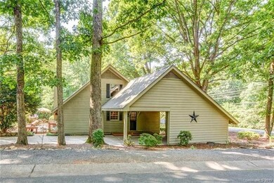 SIDE VIEW OF HOME WITH CARPORT