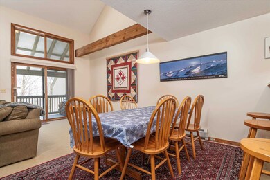 Dining room with slider to covered deck