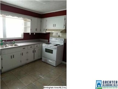 KITCHEN W-SINK AND STOVE