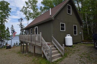 Driveway side of cottage offering...