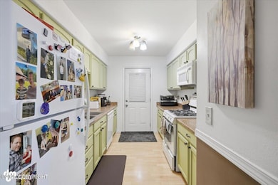 11288 Wood River Way unit 6, Eagle River, AK 99577 - photo 3