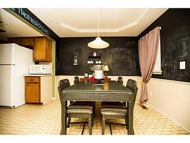 Dining Room. The walls are painted with chalkboard