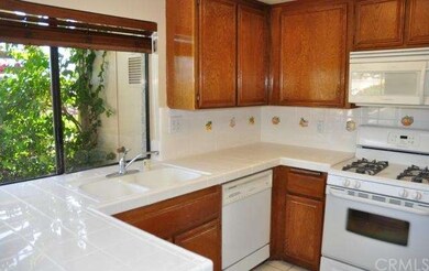 The cheery, sunny Kitchen is light & bright and ve