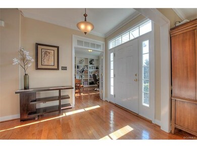 The foyer is flanked by a study and the formal din