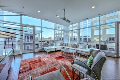 Floor to Ceiling Windows with Remote Shades Throug
