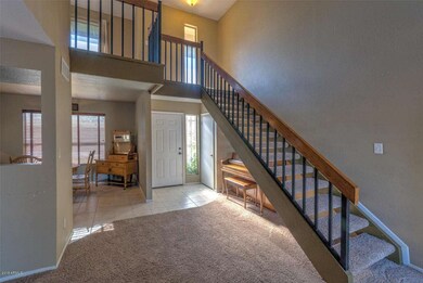 Stairs to loft and 2,3 bedrooms