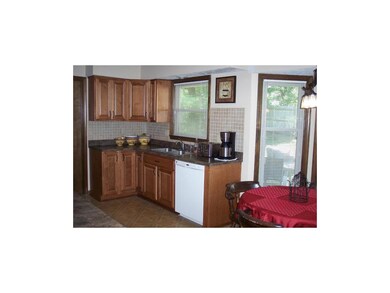 Kitchen has New Custom Cabinets, Countertops, & Ba