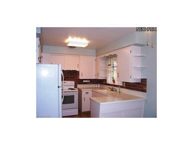 Kitchen opens to dinette area.