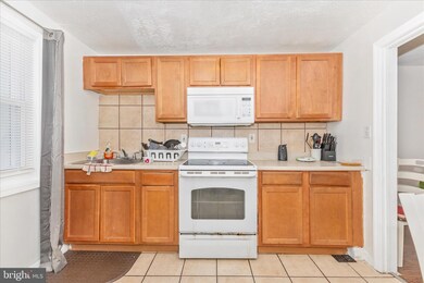 1037 Elton Ave, Baltimore, MD 21224 - photo 7