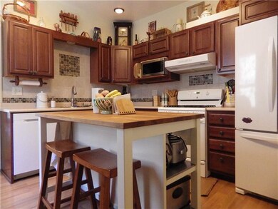 Modern backsplash and plenty of storage in this re