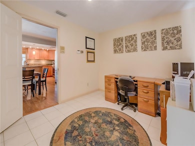 Bonus area off the kitchen works nicely as an offi