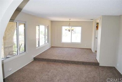 Sunken living room and Formal Dining room with vie