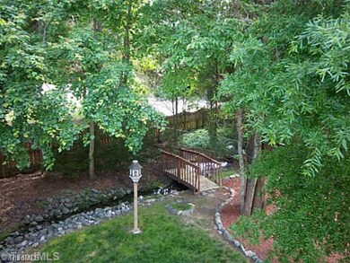 Land/Lot. Privacy abounds, fenced, heavily landscaped, just a park like setting to relax in at the end of the day.