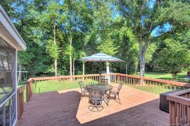 Huge deck overlooking back yard.
