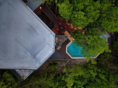 View from above of property featuring a pool area