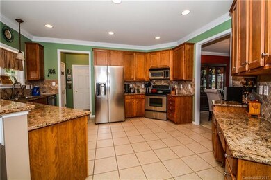 Spacious Kitchen with Granite Countertops, Stainle