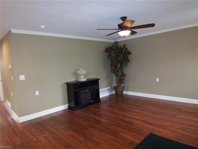 living area is approx. 16 x 14 with smooth ceiling