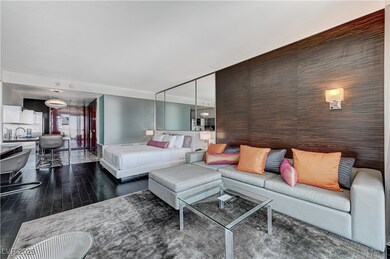 Living area with dark wood finished floors