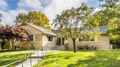 Situated on a large corner lot, this spacious ranch sits up on a hill will beautiful mature trees.