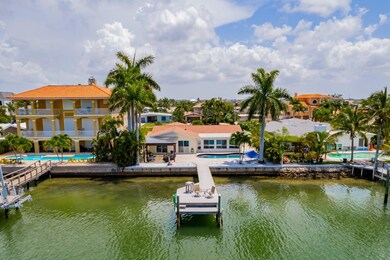 View from the canal looking toward the back of the home.